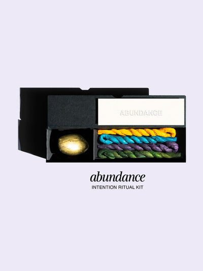United Other Abundance Intention Ritual Kit with a Chalcopyrite crystal, Four Incense Ropes (Freely, Truly, Cosmically and Nightly), and Three Incense Papers (Intentions, Release, and Abundance).