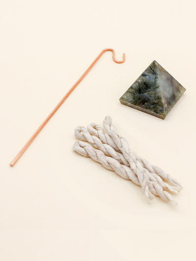 Labradorite Crystal Pyramid Incense Stand + Rope Set. LABRADORITE protects against negativity and misfortunes. Also reduces stress and anxiety, increases intuition, helps with subconscious issues, and provides mental clarity. Thought to awaken one's magical powers. Great for workspaces, as it helps dealing with transitions and everyday challenges, and will help to equip you with what you need to be successful in your field.