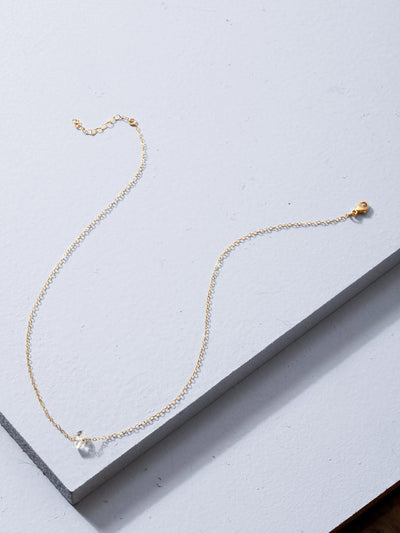 Herkimer Diamond Gold Addison Necklace. A delicate 14k rose gold fill chain choker featuring a Herkimer diamond, with an added extension chain to ensure a perfect fit. Adjustable length.