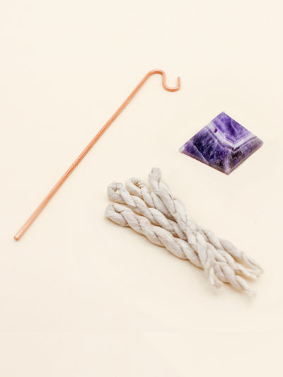 Amethyst Crystal Pyramid Incense Stand + Rope Set. AMETHYST is known as "Nature's tranquilizer," it has a clearing effect on our emotions. Soothes and disperses negative thoughts, and promotes awareness, peacefulness, and contentment. Perfect for high traffic areas and offices.