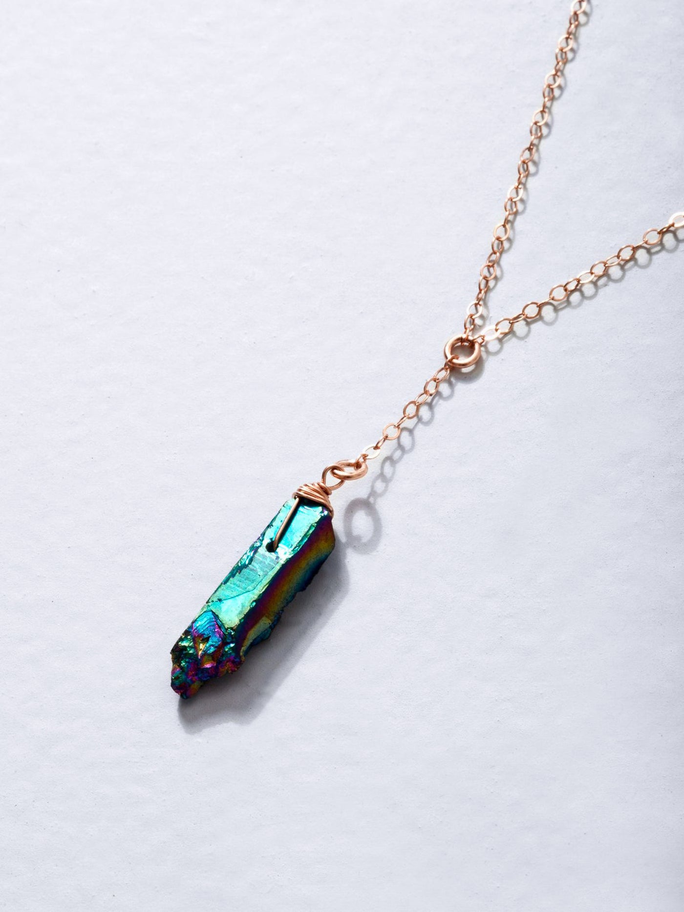 Rainbow Quartz Gold Lariat Necklace. This rainbow titanium coated quartz crystals is delicately wire wrapped and attached to high quality 14k yellow gold filled lariat style chain. Necklace length is adjustable 17-18".