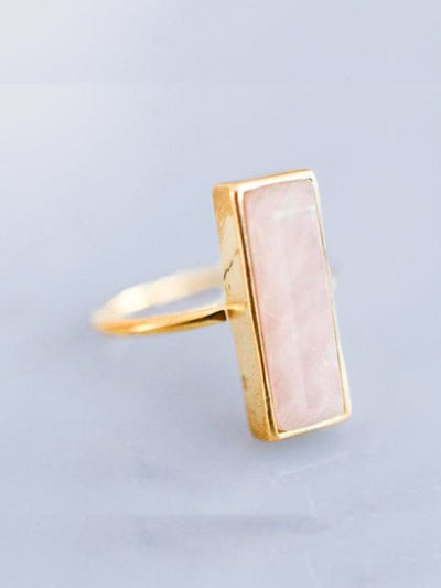 ROSE QUARTZ GEM BAR RING is bezel-set in a recycled brass band with 24K gold overlay. Size 7.