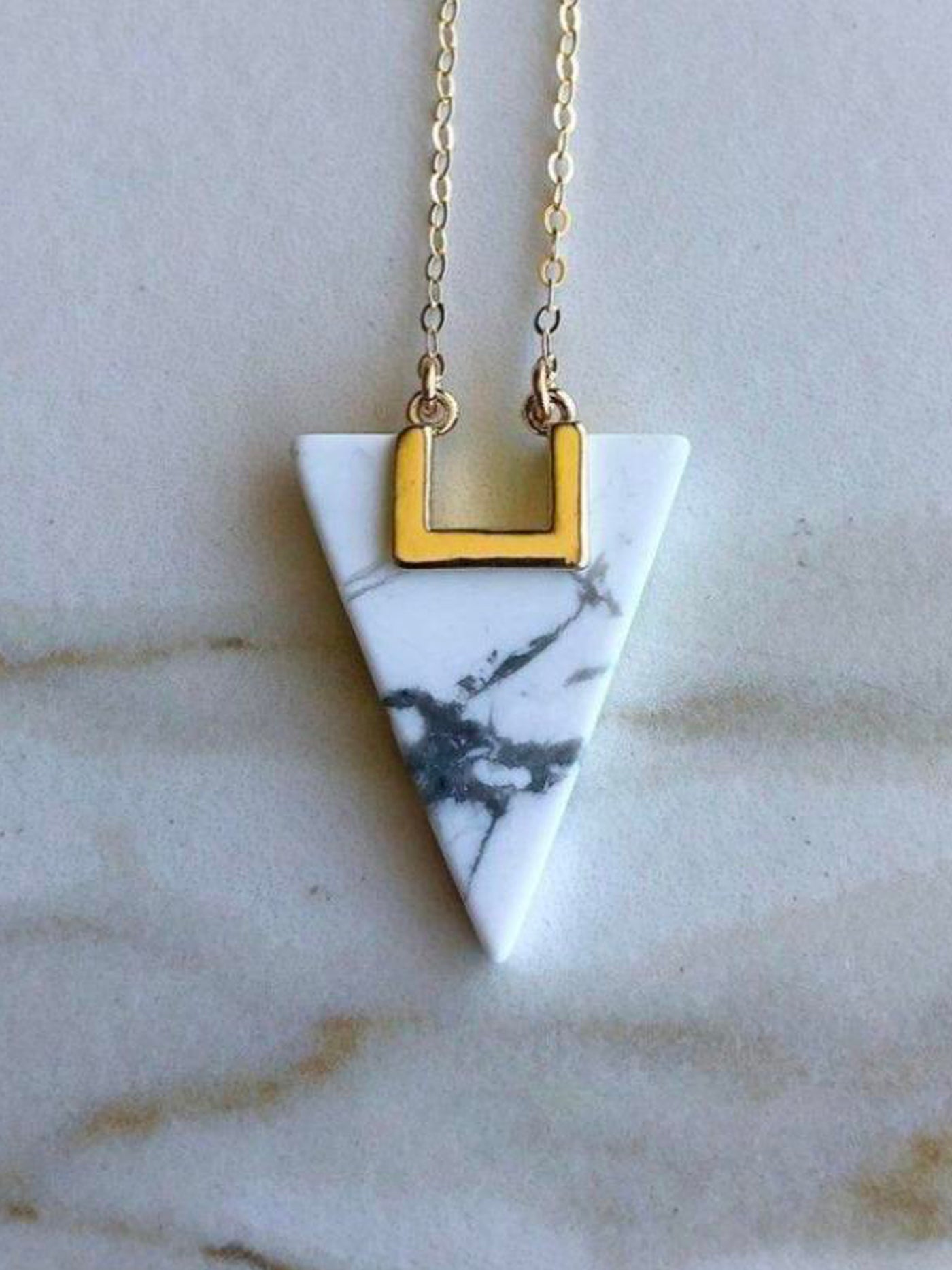 HOWLITE TRIANGLE GEOMETRIC NECKLACE. Howlite triangle geometric stone hangs delicately from a 14K gold filled 18" chain.