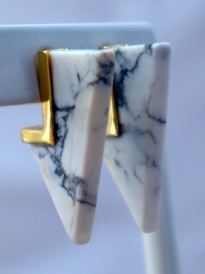 HOWLITE DAGGER STUDS. Howlite geometric and modern dagger studs are attached to stainless steel post with 24K gold overlay.