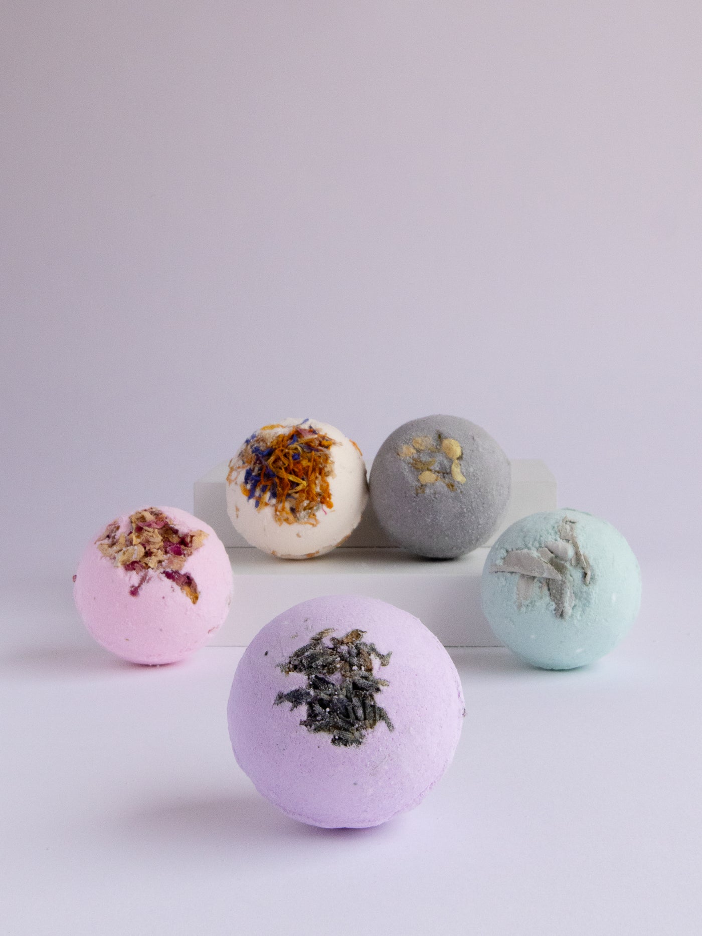 The Lavender Love Bomb is made with coconut oil, dried lavender and lavender essential oil. This bomb will leave you feeling relaxed and stress-free! Handmade in Ojai, CA.