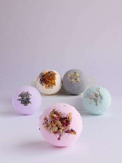 The Rose City Bath Bomb is made with coconut oil, rose petals, absolute rose essential oil and rose water. This bomb makes for a luxurious bath! Handmade in Ojai, CA.
