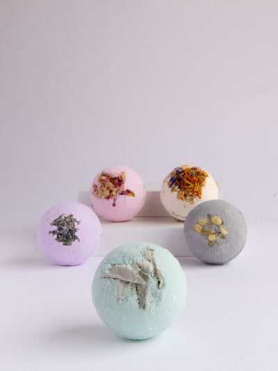 Sister Sage bath bomb is made with coconut oil, white sage, Dalmatian sage, peppermint and clary sage essential oils as well as Dead Sea and eucalyptus salts. Handmade in Ojai, CA.