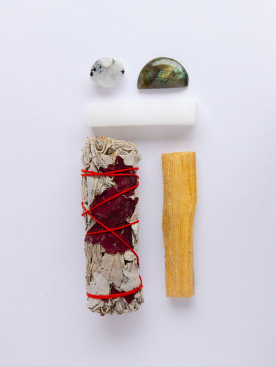New Moon Crystal Kit with Rainbow Moonstone, Labradorite, Selenite, White Sage, and Palo Santo.