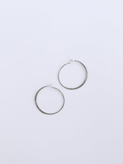 Silver Small Crescent Moon Hoops are hand formed using 20 gauge wire and are made with high quality hammered sterling silver metal that measure 7/8" across.