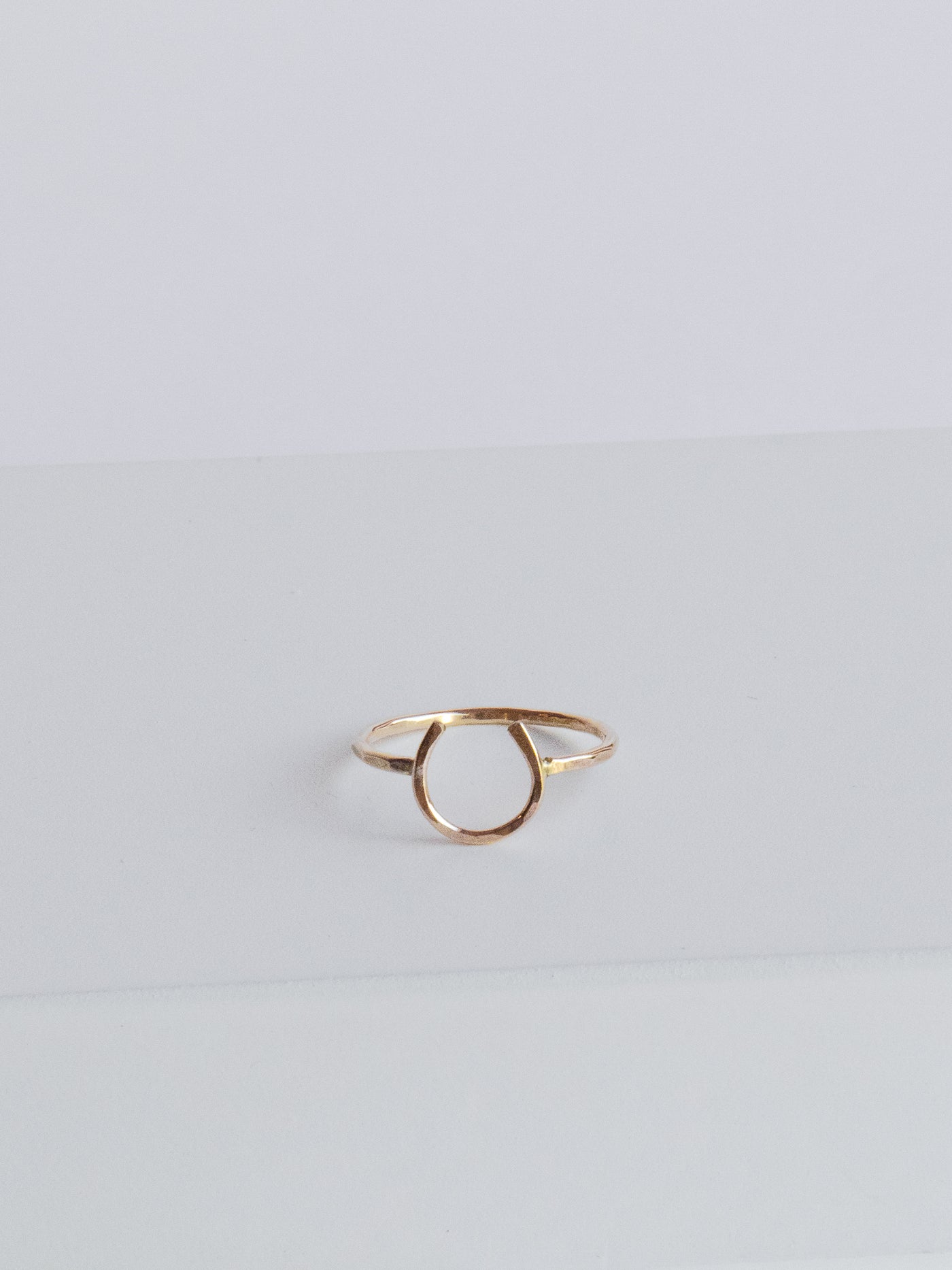 Gold Small Lucky Horseshoe Ring. Made from 14k yellow gold fill in a size 7.