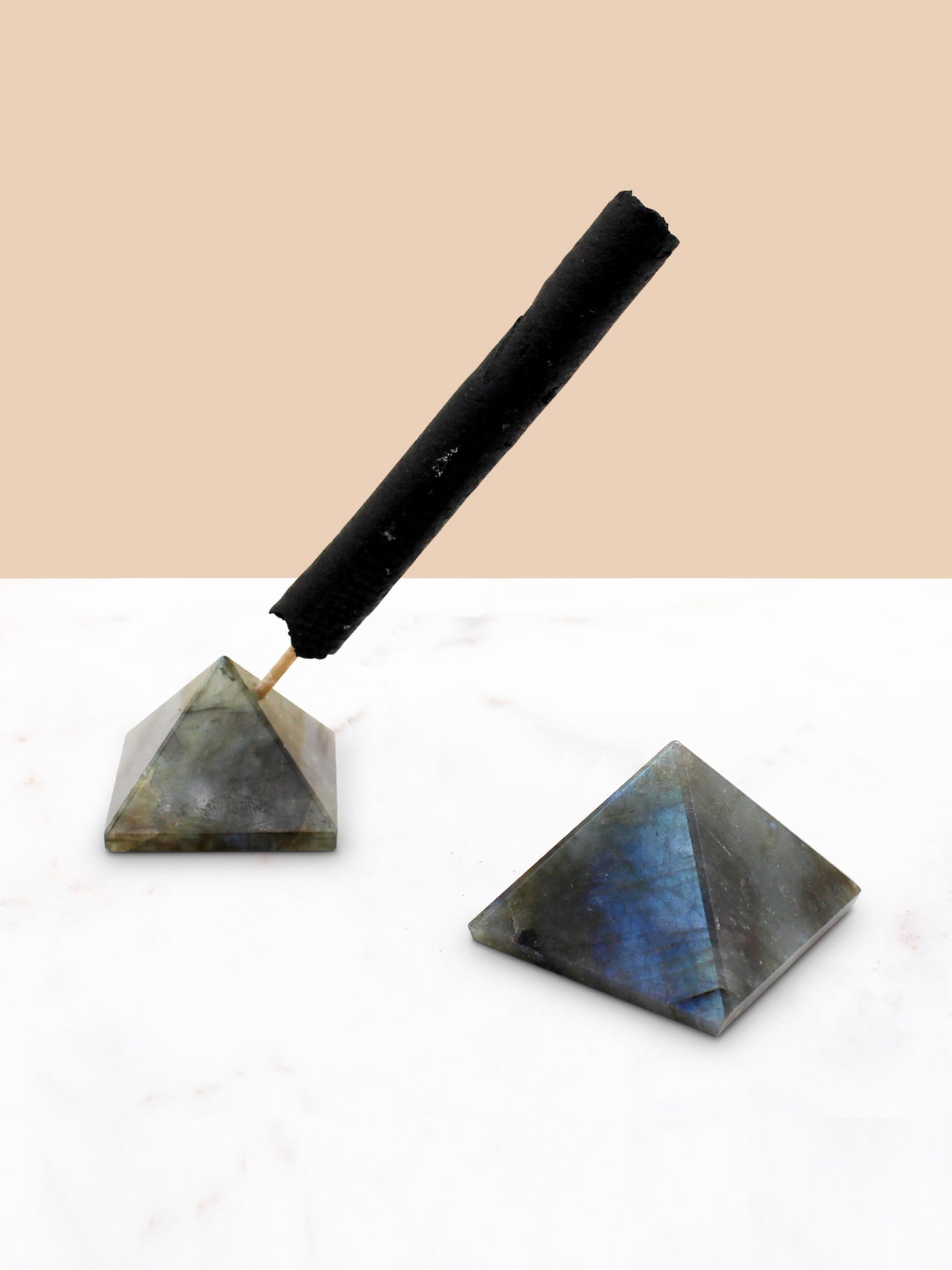 Labradorite Crystal Pyramid Incense Stand + Rope Set. LABRADORITE protects against negativity and misfortunes. Also reduces stress and anxiety, increases intuition, helps with subconscious issues, and provides mental clarity. Thought to awaken one's magical powers. Great for workspaces, as it helps dealing with transitions and everyday challenges, and will help to equip you with what you need to be successful in your field.