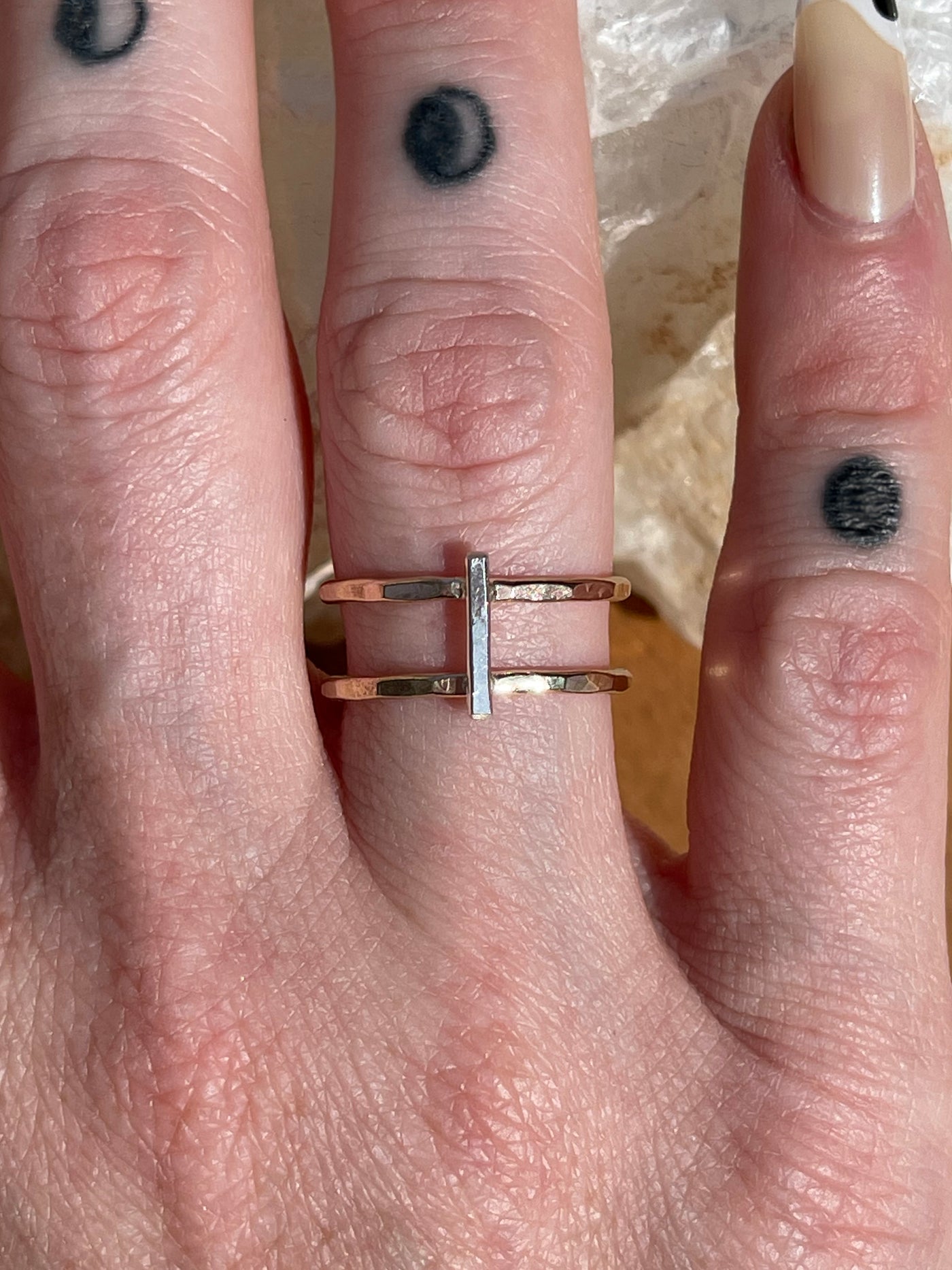 Gold and Silver Bar Ring. This hammered-style ring is made from high quality sterling silver and 14k yellow gold filled metal and great as a single standalone ring or as a stacker. Size 6. 