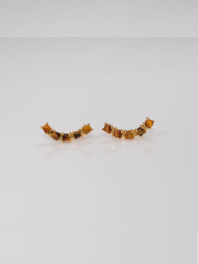 GOLD TIGERS EYE PAVE CRAWLER STUDS. Made of recycled brass with 24K gold overlay. Attached to stainless steel post with 24K gold overlay.
