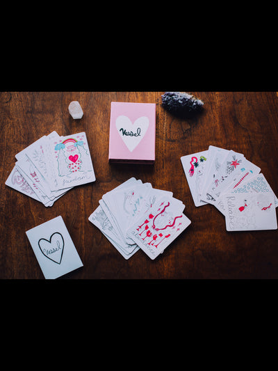 The Vessel Oracle Deck is a bright and whimsical oracle deck consisting of 35 cards. The name comes from the idea that our heart is a vessel, containing our deepest of feelings. Use these cards in addition to tarot or by themselves in a simple one or three card reading. 